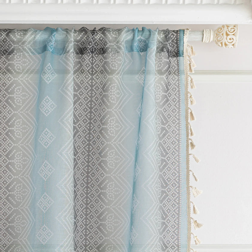 Light Blue Sheer Curtains with Subtle Geometric Pattern ¨C Add a serene and airy touch to your home with these elegant sheer curtains in a soft light blue hue, adorned with a delicate geometric design. The lightweight fabric gently diffuses natural sunlight, brightening your space while maintaining privacy. Finished with charming tassel edges, these curtains are perfect for living rooms, bedrooms, or coastal-themed interiors, creating a calm and stylish ambiance.
