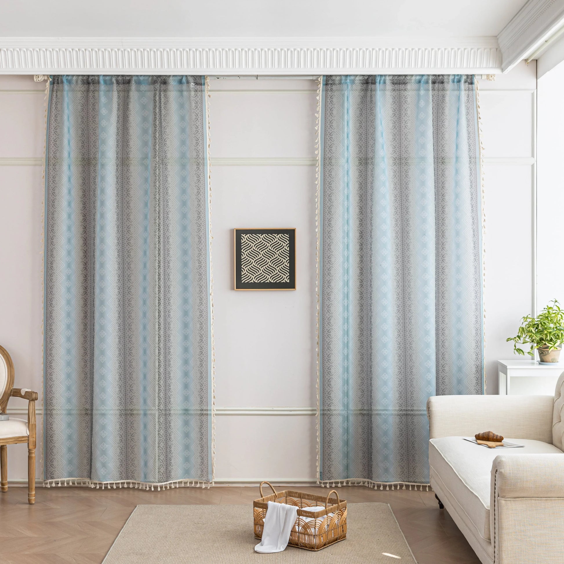 Light Blue Sheer Curtains with Subtle Geometric Pattern – Add a serene and airy touch to your home with these elegant sheer curtains in a soft light blue hue, adorned with a delicate geometric design. The lightweight fabric gently diffuses natural sunlight, brightening your space while maintaining privacy. Finished with charming tassel edges, these curtains are perfect for living rooms, bedrooms, or coastal-themed interiors, creating a calm and stylish ambiance.
