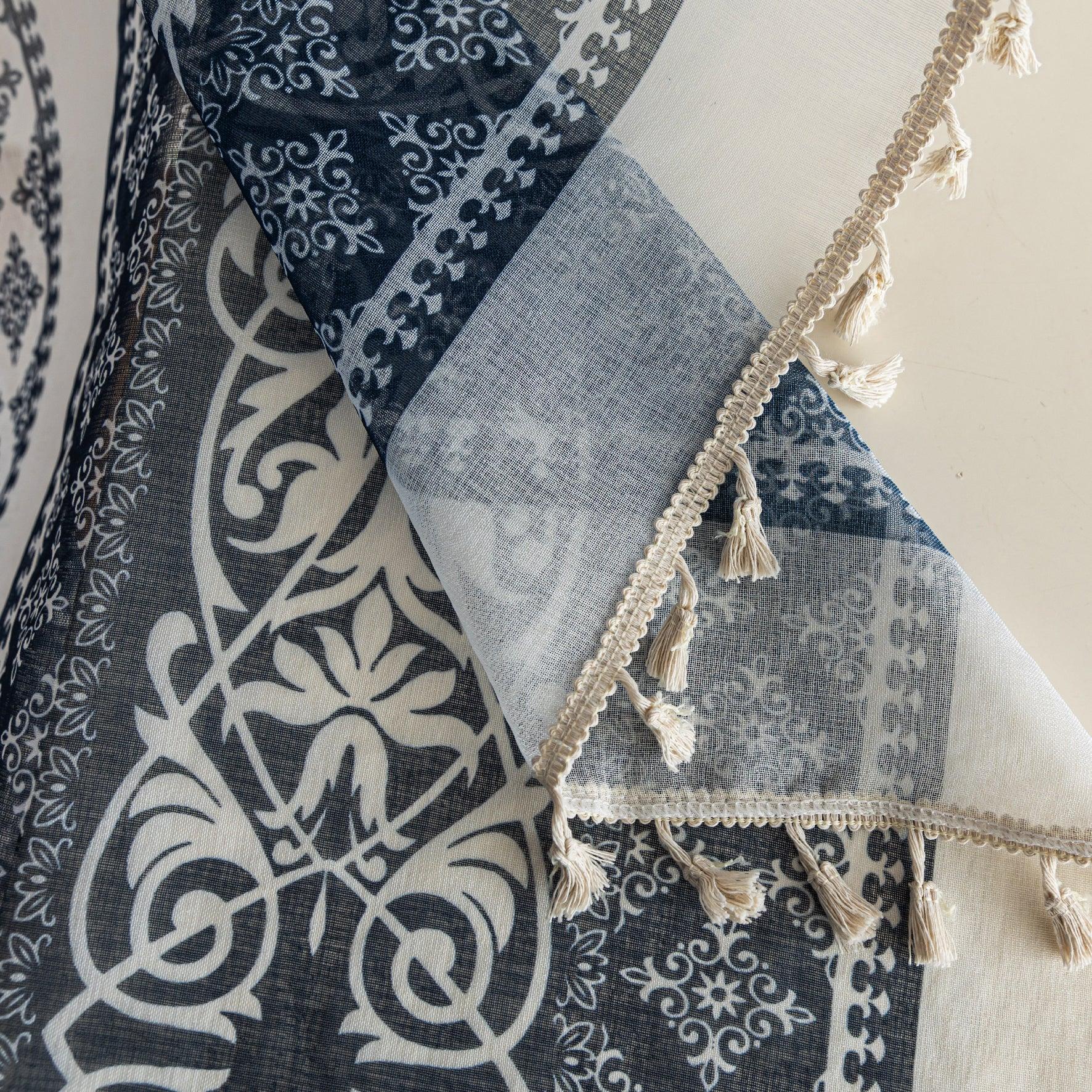 Elegant Blue and White Striped Sheer Curtains – Enhance your home décor with these beautifully designed sheer curtains featuring alternating stripes of intricate floral and geometric patterns in calming blue and crisp white tones. The lightweight, airy fabric allows natural light to filter through while maintaining privacy, creating a bright and inviting atmosphere. Finished with delicate tassel edging, these curtains are perfect for adding a touch of sophistication to living rooms, bedrooms, or coastal-ins