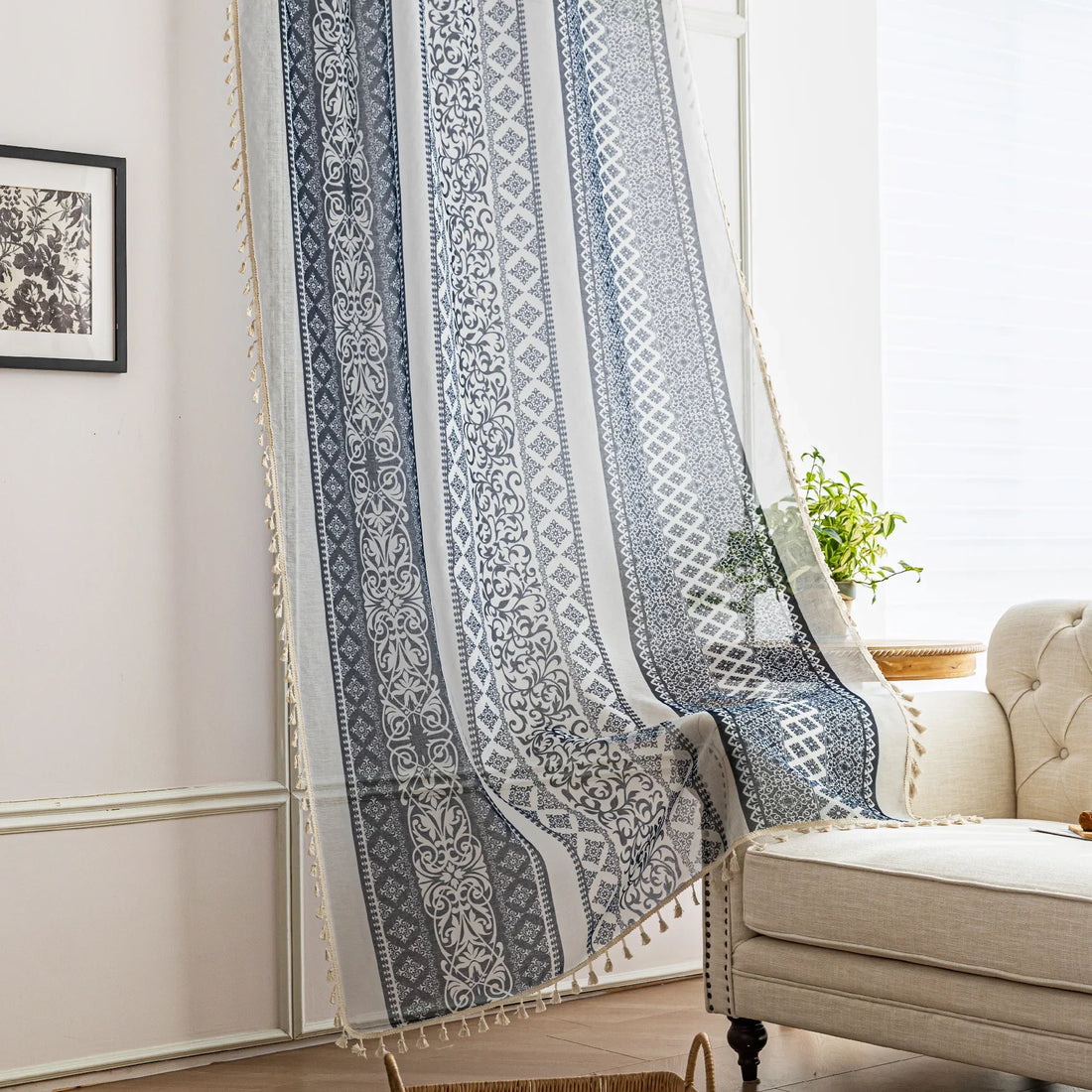 Elegant Blue and White Striped Sheer Curtains – Enhance your home décor with these beautifully designed sheer curtains featuring alternating stripes of intricate floral and geometric patterns in calming blue and crisp white tones. The lightweight, airy fabric allows natural light to filter through while maintaining privacy, creating a bright and inviting atmosphere. Finished with delicate tassel edging, these curtains are perfect for adding a touch of sophistication to living rooms, bedrooms, or coastal-ins
