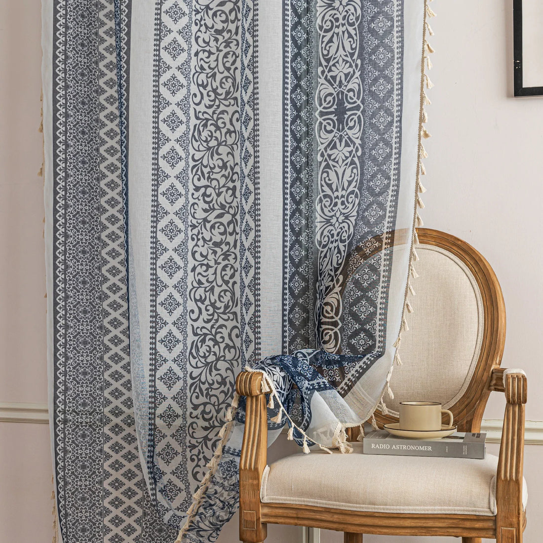 Elegant Blue and White Striped Sheer Curtains – Enhance your home décor with these beautifully designed sheer curtains featuring alternating stripes of intricate floral and geometric patterns in calming blue and crisp white tones. The lightweight, airy fabric allows natural light to filter through while maintaining privacy, creating a bright and inviting atmosphere. Finished with delicate tassel edging, these curtains are perfect for adding a touch of sophistication to living rooms, bedrooms, or coastal-ins