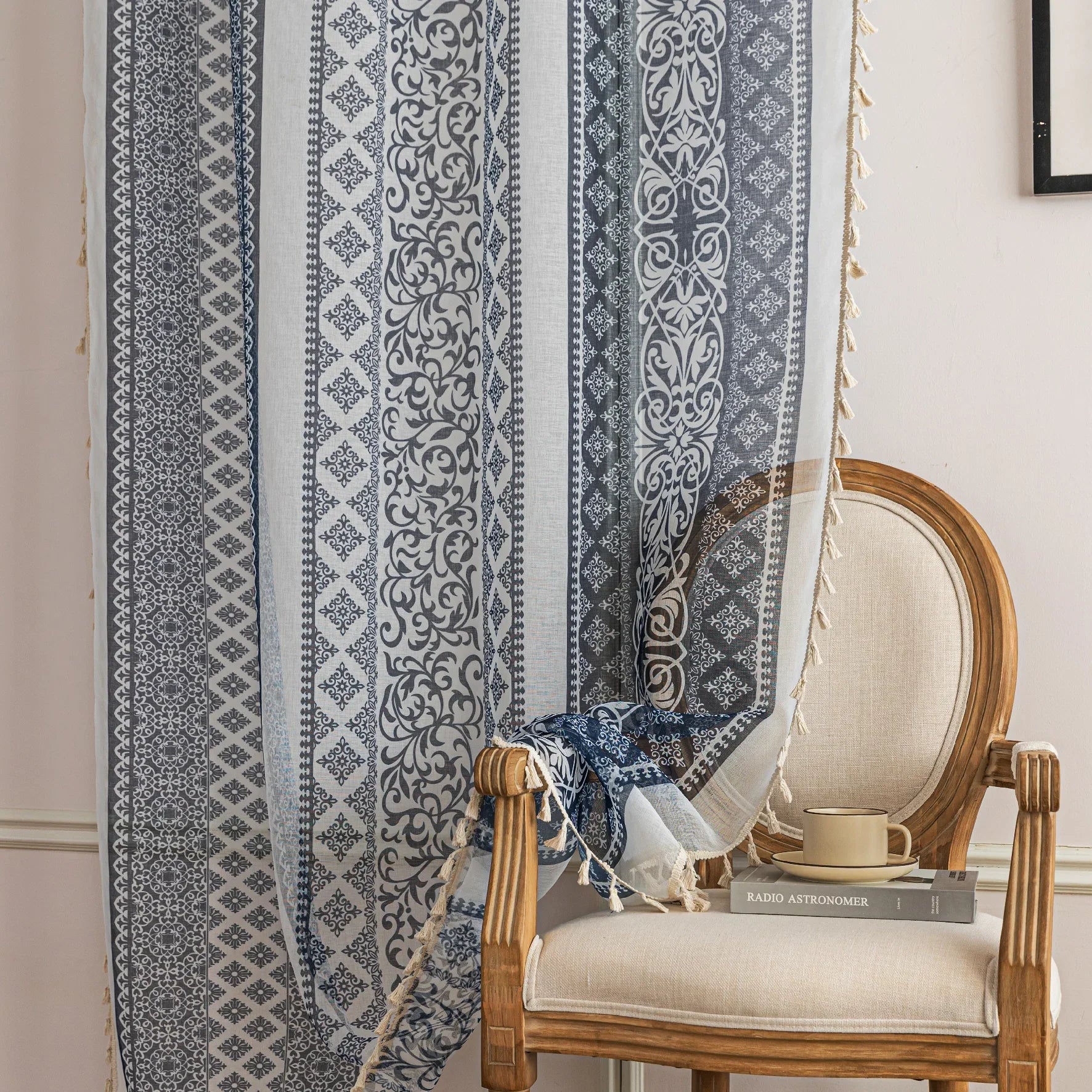 Elegant Blue and White Striped Sheer Curtains – Enhance your home décor with these beautifully designed sheer curtains featuring alternating stripes of intricate floral and geometric patterns in calming blue and crisp white tones. The lightweight, airy fabric allows natural light to filter through while maintaining privacy, creating a bright and inviting atmosphere. Finished with delicate tassel edging, these curtains are perfect for adding a touch of sophistication to living rooms, bedrooms, or coastal-ins