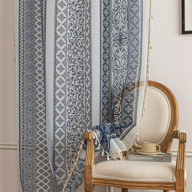 Elegant Blue and White Striped Sheer Curtains ¨C Enhance your home d¨¦cor with these beautifully designed sheer curtains featuring alternating stripes of intricate floral and geometric patterns in calming blue and crisp white tones. The lightweight, airy fabric allows natural light to filter through while maintaining privacy, creating a bright and inviting atmosphere. Finished with delicate tassel edging, these curtains are perfect for adding a touch of sophistication to living rooms, bedrooms, or coastal-i