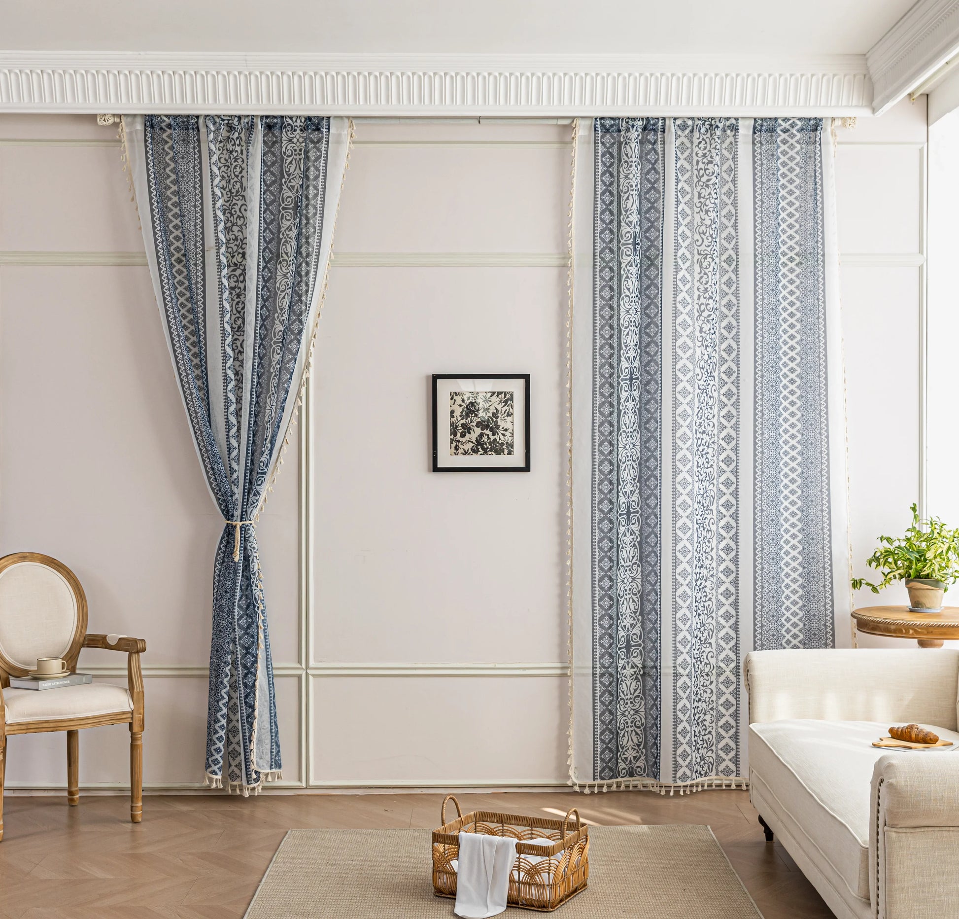 Elegant Blue and White Striped Sheer Curtains – Enhance your home décor with these beautifully designed sheer curtains featuring alternating stripes of intricate floral and geometric patterns in calming blue and crisp white tones. The lightweight, airy fabric allows natural light to filter through while maintaining privacy, creating a bright and inviting atmosphere. Finished with delicate tassel edging, these curtains are perfect for adding a touch of sophistication to living rooms, bedrooms, or coastal-in
