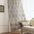 Elegant Beige and Grey Floral Sheer Curtains – Add a touch of timeless charm to your home with these delicate sheer curtains featuring an intricate floral damask pattern in soft grey tones on a warm beige background. Designed to gently filter sunlight while maintaining privacy, these lightweight curtains create an airy and inviting atmosphere, perfect for living rooms, bedrooms, or vintage-inspired interiors. Finished with subtle tassel edging for an extra hint of sophistication.
