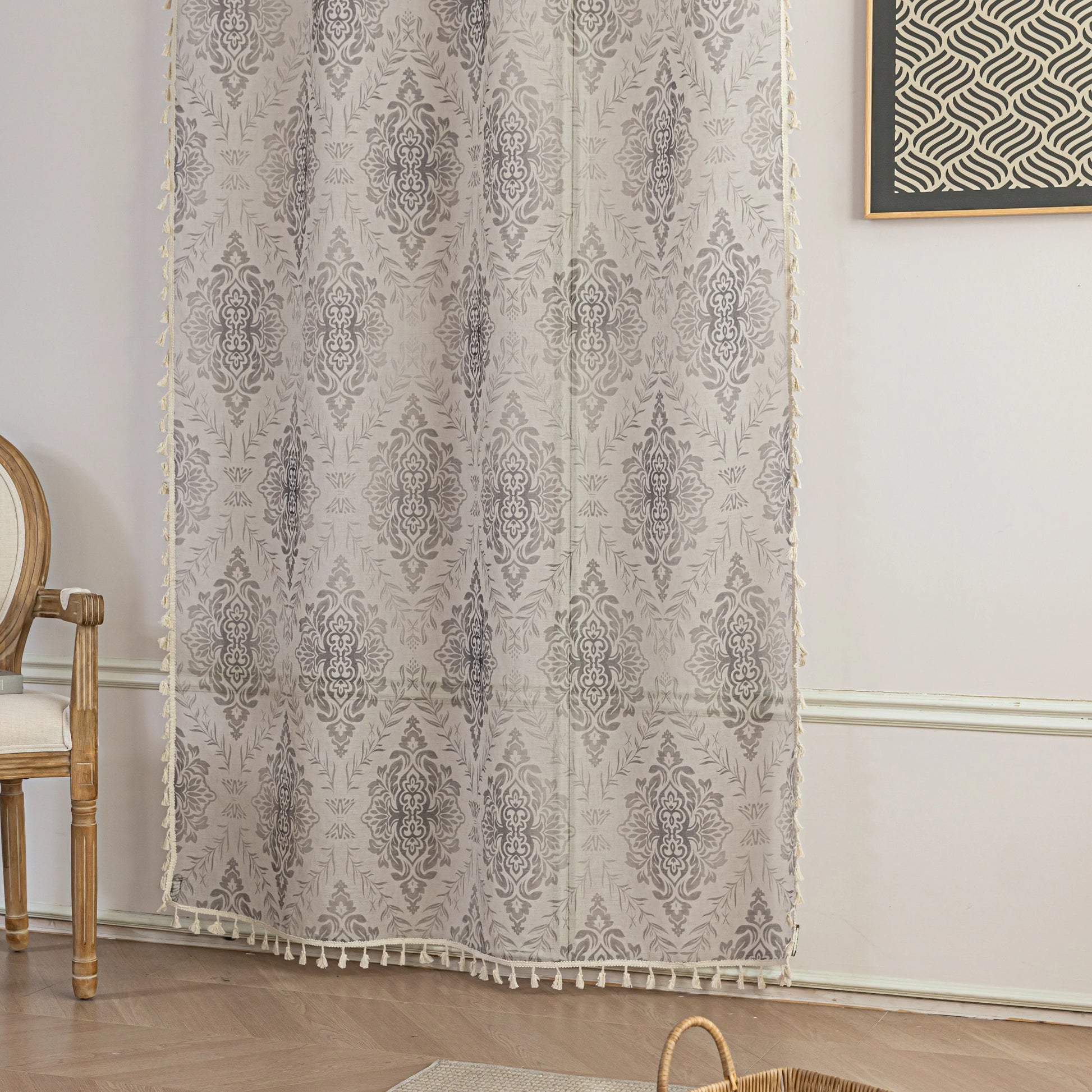 Elegant Beige and Grey Floral Sheer Curtains – Add a touch of timeless charm to your home with these delicate sheer curtains featuring an intricate floral damask pattern in soft grey tones on a warm beige background. Designed to gently filter sunlight while maintaining privacy, these lightweight curtains create an airy and inviting atmosphere, perfect for living rooms, bedrooms, or vintage-inspired interiors. Finished with subtle tassel edging for an extra hint of sophistication.
