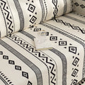 Modern black and white geometric patterned sofa cover with tribal-inspired diamond and stripe designs.