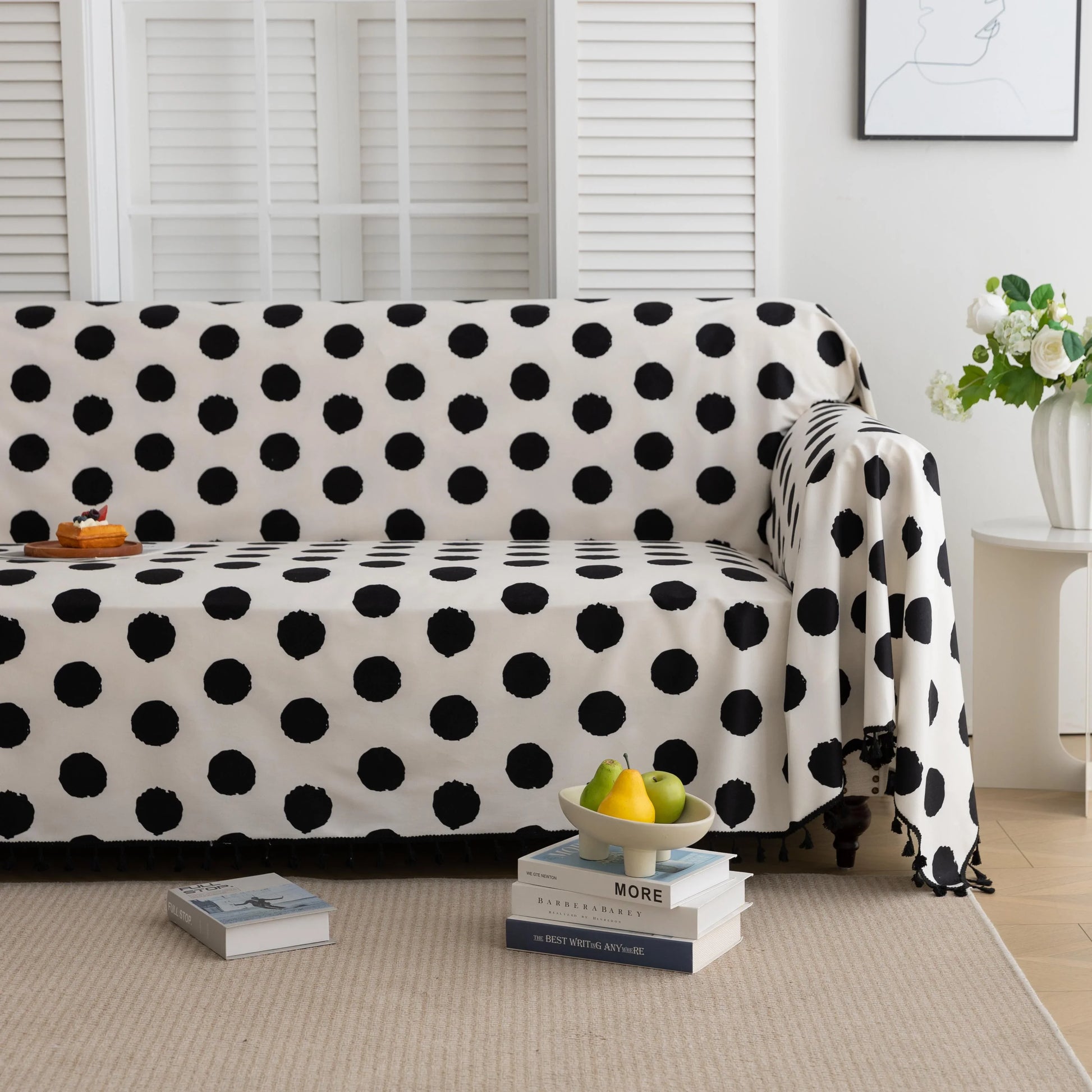 Black and White Polka Dot Sofa Cover – Bring a bold, modern twist to your living space with this eye-catching sofa cover featuring a classic black polka dot pattern on a crisp white background. Crafted from high-quality, soft, and durable fabric, it offers reliable protection against spills, stains, and everyday wear while instantly elevating your home décor. Perfect for contemporary, minimalist, or playful interiors, this slipcover combines functionality with timeless style to give your couch a fresh and f