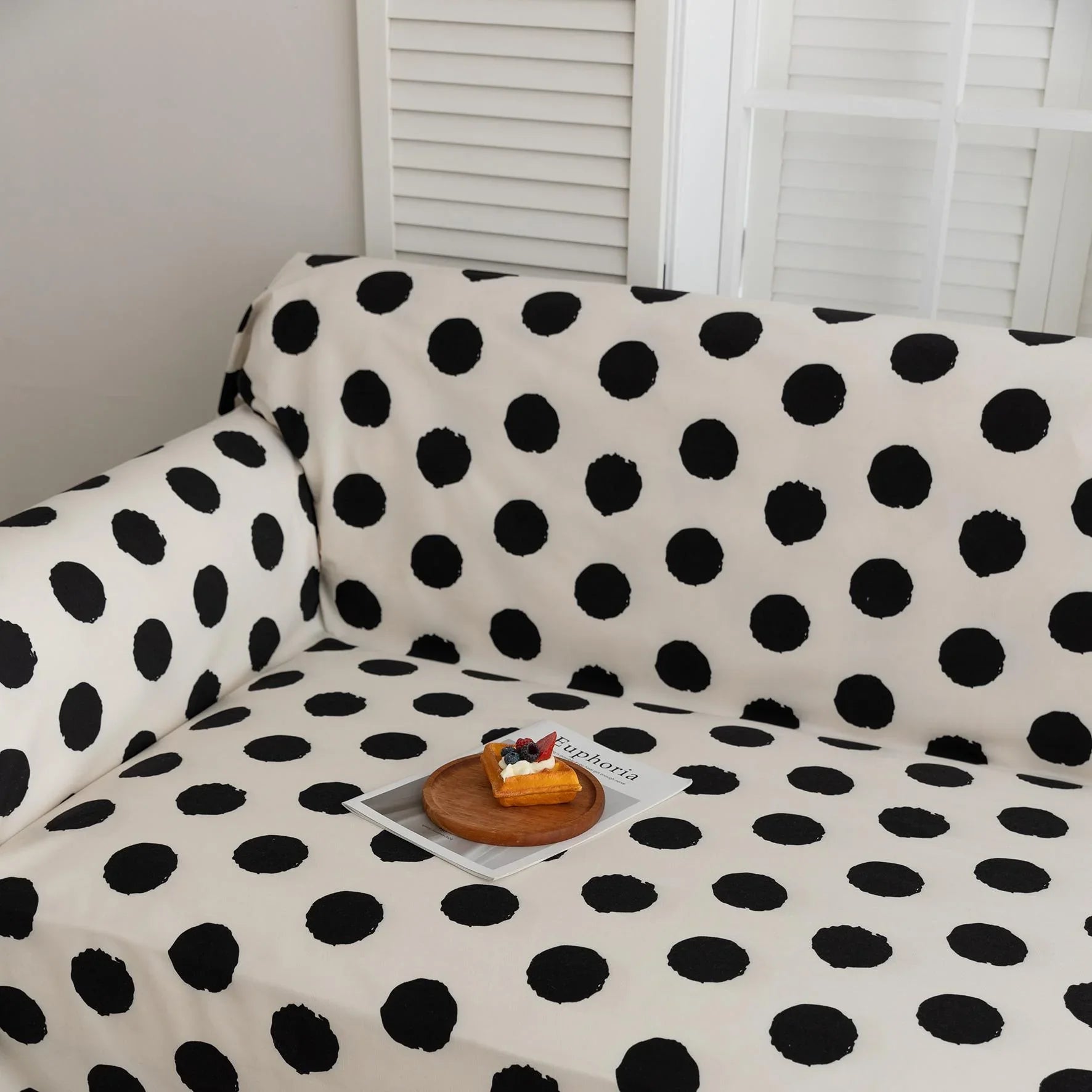 Black and White Polka Dot Sofa Cover – Bring a bold, modern twist to your living space with this eye-catching sofa cover featuring a classic black polka dot pattern on a crisp white background. Crafted from high-quality, soft, and durable fabric, it offers reliable protection against spills, stains, and everyday wear while instantly elevating your home décor. Perfect for contemporary, minimalist, or playful interiors, this slipcover combines functionality with timeless style to give your couch a fresh and f
