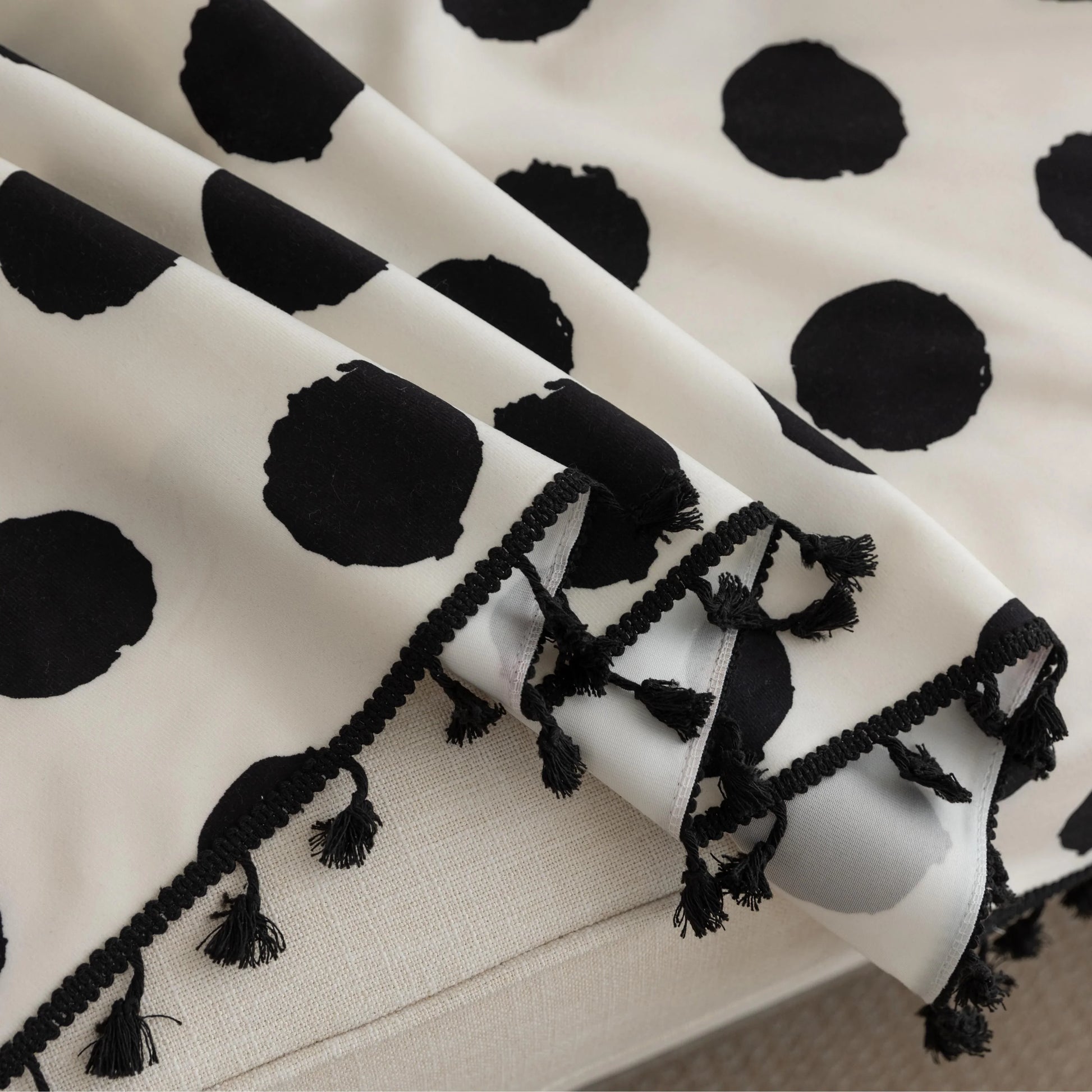 Black and White Polka Dot Sofa Cover – Bring a bold, modern twist to your living space with this eye-catching sofa cover featuring a classic black polka dot pattern on a crisp white background. Crafted from high-quality, soft, and durable fabric, it offers reliable protection against spills, stains, and everyday wear while instantly elevating your home décor. Perfect for contemporary, minimalist, or playful interiors, this slipcover combines functionality with timeless style to give your couch a fresh and f