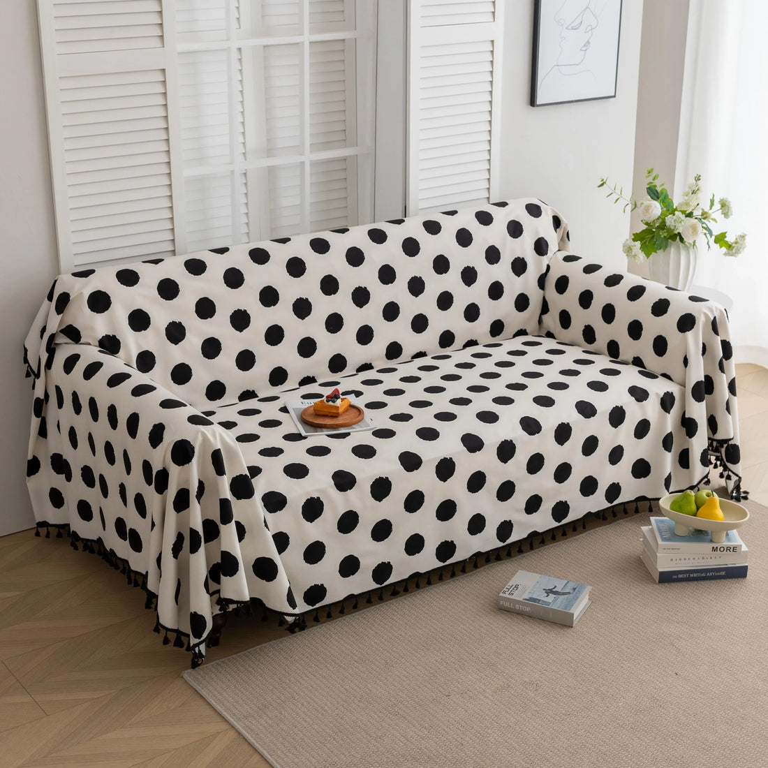 Black and White Polka Dot Sofa Cover – Bring a bold, modern twist to your living space with this eye-catching sofa cover featuring a classic black polka dot pattern on a crisp white background. Crafted from high-quality, soft, and durable fabric, it offers reliable protection against spills, stains, and everyday wear while instantly elevating your home décor. Perfect for contemporary, minimalist, or playful interiors, this slipcover combines functionality with timeless style to give your couch a fresh and f