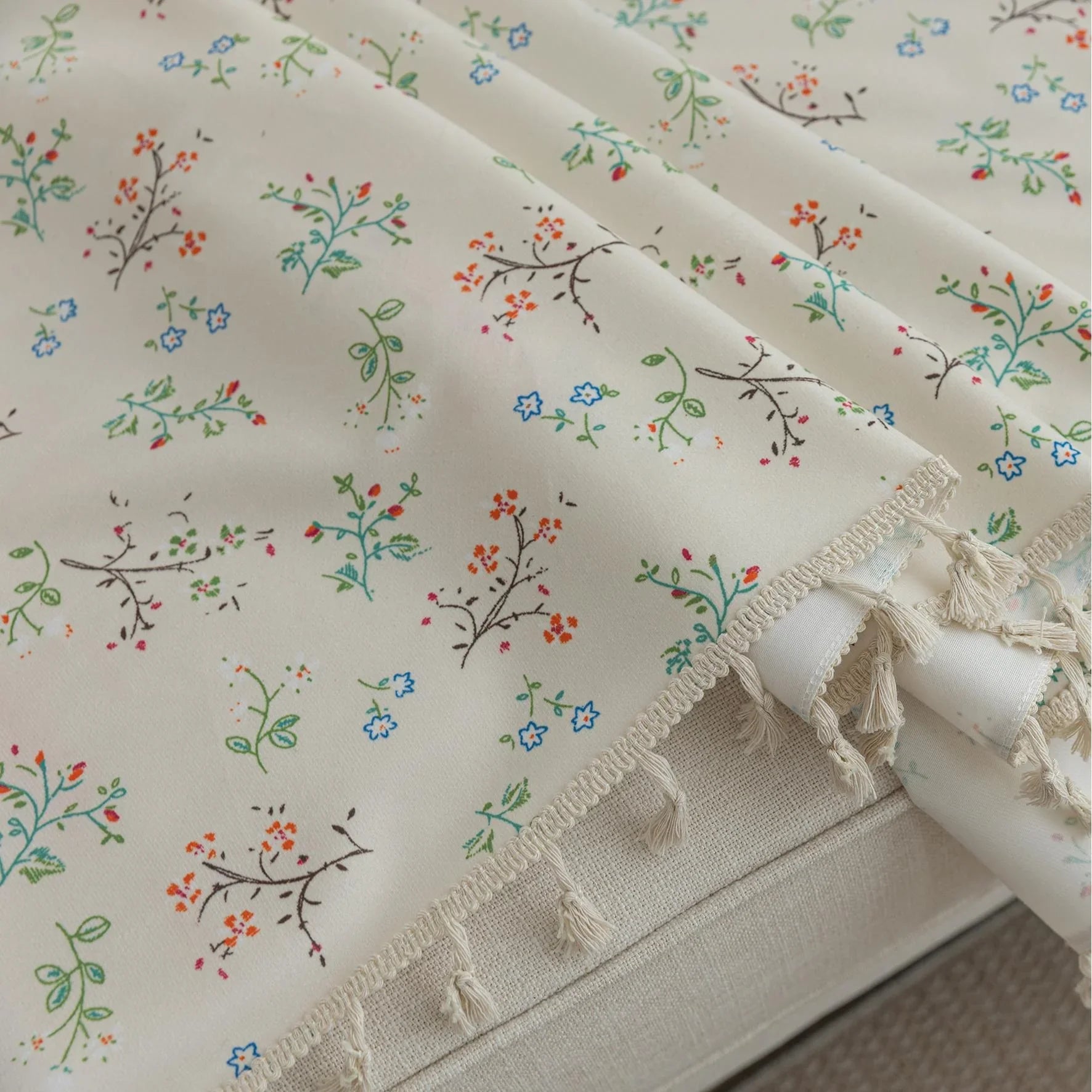 Cream Floral Sofa Cover – Add a touch of elegance and charm to your living room with this beautifully designed sofa cover featuring a soft cream background adorned with delicate, multicolored floral sprigs. Made from durable and comfortable fabric, it provides excellent protection against spills, stains, and everyday wear while giving your couch a fresh, cozy makeover. Perfect for vintage, cottage, or minimalist interiors, this slipcover blends timeless beauty with practical functionality for a stylish and 