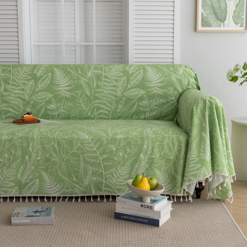 Fresh Green Leaf Sofa Cover ¨C Refresh your living space with this nature-inspired sofa cover featuring a soft green background adorned with delicate white leaf patterns. Crafted from durable, breathable fabric, it offers excellent protection against spills, stains, and everyday wear while adding a calming, botanical touch to your home d¨¦cor. Perfect for modern, eco-friendly, or minimalist interiors, this slipcover blends style and functionality, instantly revitalizing your couch with a fresh, inviting loo