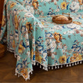 Floral Aqua Sofa Cover – Brighten your living space with this elegant sofa cover featuring a fresh aqua background adorned with large, detailed blossoms in shades of yellow, white, and blue. Made from soft, breathable, and durable fabric, it offers excellent protection against spills, stains, and daily wear while adding a refreshing burst of color to your décor. Perfect for farmhouse, cottage, or vintage-inspired interiors, this slipcover blends functionality with timeless floral charm, instantly revitalizi