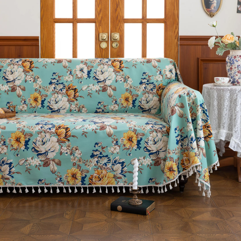 Floral Aqua Sofa Cover ¨C Brighten your living space with this elegant sofa cover featuring a fresh aqua background adorned with large, detailed blossoms in shades of yellow, white, and blue. Made from soft, breathable, and durable fabric, it offers excellent protection against spills, stains, and daily wear while adding a refreshing burst of color to your d¨¦cor. Perfect for farmhouse, cottage, or vintage-inspired interiors, this slipcover blends functionality with timeless floral charm, instantly revitali