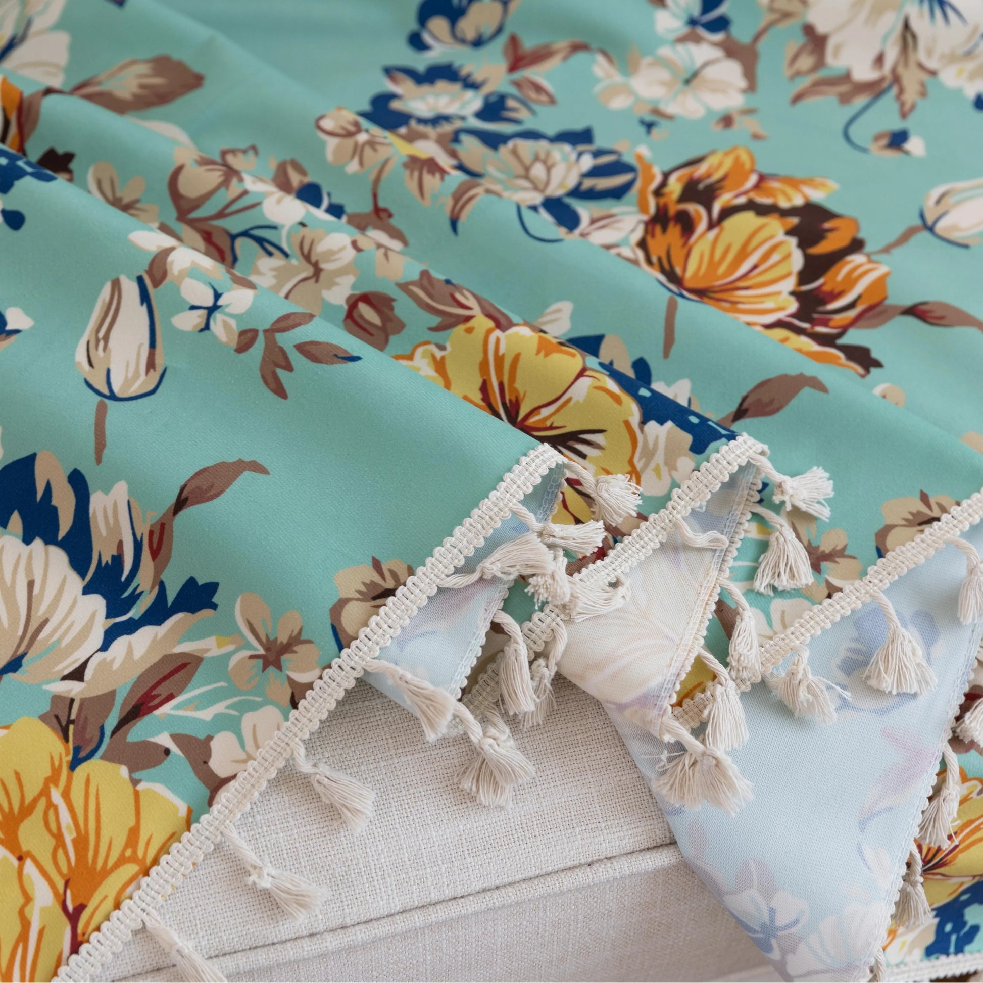 Floral Aqua Sofa Cover – Brighten your living space with this elegant sofa cover featuring a fresh aqua background adorned with large, detailed blossoms in shades of yellow, white, and blue. Made from soft, breathable, and durable fabric, it offers excellent protection against spills, stains, and daily wear while adding a refreshing burst of color to your décor. Perfect for farmhouse, cottage, or vintage-inspired interiors, this slipcover blends functionality with timeless floral charm, instantly revitalizi
