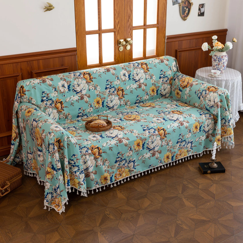Floral Aqua Sofa Cover ¨C Brighten your living space with this elegant sofa cover featuring a fresh aqua background adorned with large, detailed blossoms in shades of yellow, white, and blue. Made from soft, breathable, and durable fabric, it offers excellent protection against spills, stains, and daily wear while adding a refreshing burst of color to your d¨¦cor. Perfect for farmhouse, cottage, or vintage-inspired interiors, this slipcover blends functionality with timeless floral charm, instantly revitali