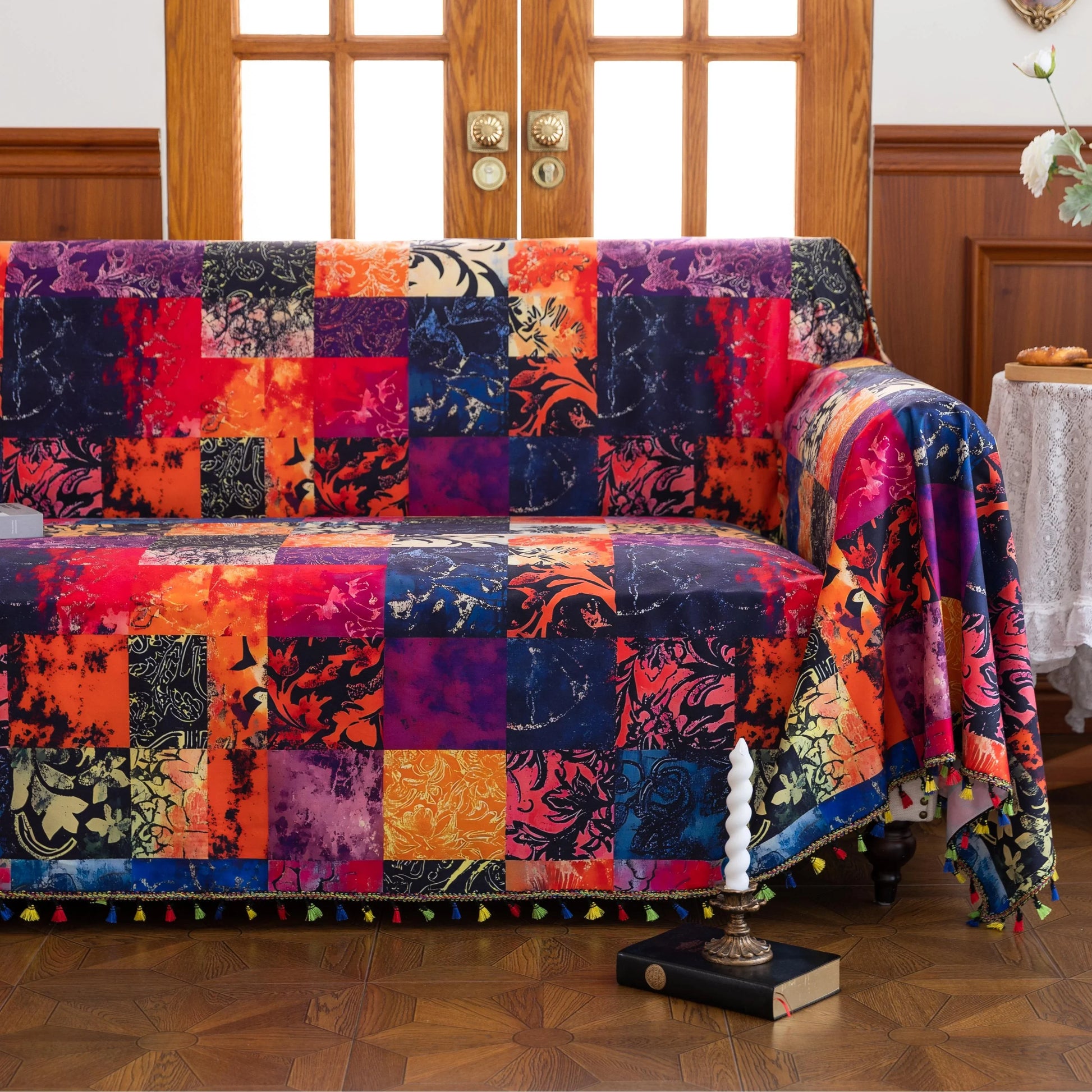 Colorful Patchwork Sofa Cover – Add a bold and artistic statement to your home with this vibrant patchwork-style sofa cover, featuring an array of rich reds, deep blues, warm oranges, and golden yellows. Crafted from soft, durable fabric, it not only protects your couch from spills, dust, and wear but also instantly refreshes your living room with a cozy, bohemian charm. Perfect for modern, eclectic, or artistic interiors, this slipcover offers a unique blend of functionality and eye-catching design for yea