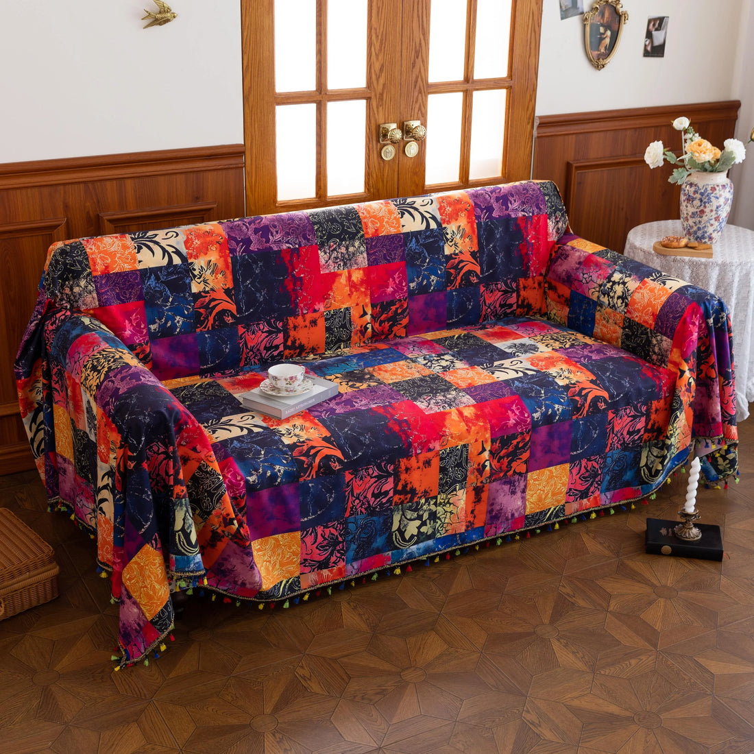 Colorful Patchwork Sofa Cover – Add a bold and artistic statement to your home with this vibrant patchwork-style sofa cover, featuring an array of rich reds, deep blues, warm oranges, and golden yellows. Crafted from soft, durable fabric, it not only protects your couch from spills, dust, and wear but also instantly refreshes your living room with a cozy, bohemian charm. Perfect for modern, eclectic, or artistic interiors, this slipcover offers a unique blend of functionality and eye-catching design for yea