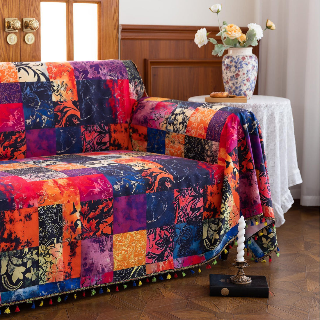 Colorful Patchwork Sofa Cover – Add a bold and artistic statement to your home with this vibrant patchwork-style sofa cover, featuring an array of rich reds, deep blues, warm oranges, and golden yellows. Crafted from soft, durable fabric, it not only protects your couch from spills, dust, and wear but also instantly refreshes your living room with a cozy, bohemian charm. Perfect for modern, eclectic, or artistic interiors, this slipcover offers a unique blend of functionality and eye-catching design for yea