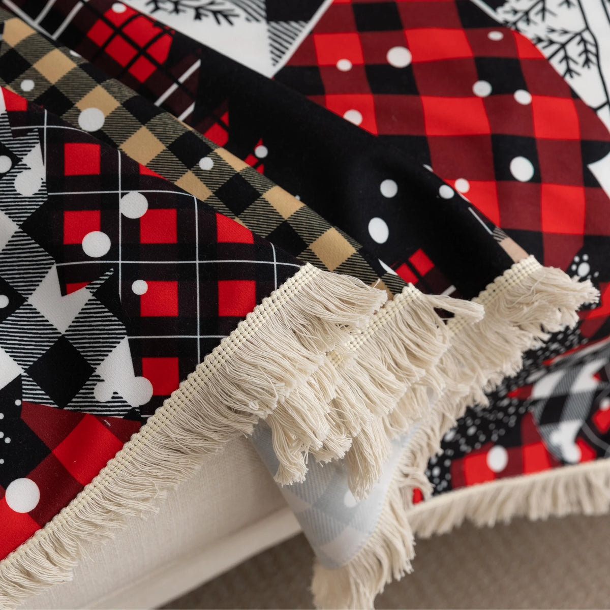 Christmas Plaid Sofa Cover ¨C Bring holiday cheer to your home with this cozy black-and-white buffalo check sofa cover, featuring festive ¡°Merry Christmas¡± lettering and colorful patchwork Christmas tree patterns in red, black, and beige tartan designs. Made from soft, durable fabric with decorative fringe edges, it protects your couch from spills, dust, and wear while adding a warm, seasonal touch. Perfect for winter d¨¦cor, Christmas parties, and farmhouse-style interiors, this slipcover combines functi