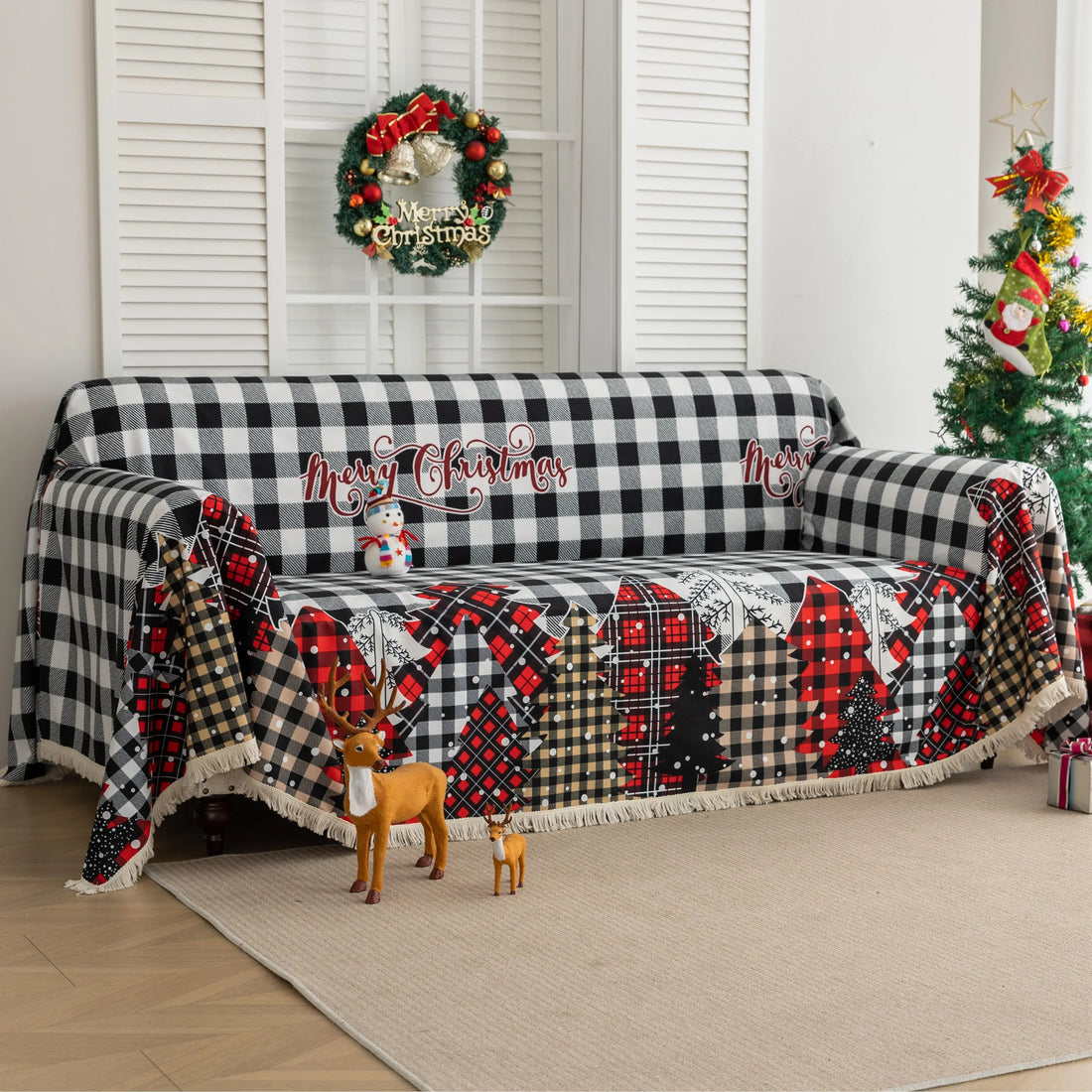 Christmas Plaid Sofa Cover – Bring holiday cheer to your home with this cozy black-and-white buffalo check sofa cover, featuring festive “Merry Christmas” lettering and colorful patchwork Christmas tree patterns in red, black, and beige tartan designs. Made from soft, durable fabric with decorative fringe edges, it protects your couch from spills, dust, and wear while adding a warm, seasonal touch. Perfect for winter décor, Christmas parties, and farmhouse-style interiors, this slipcover combines function a