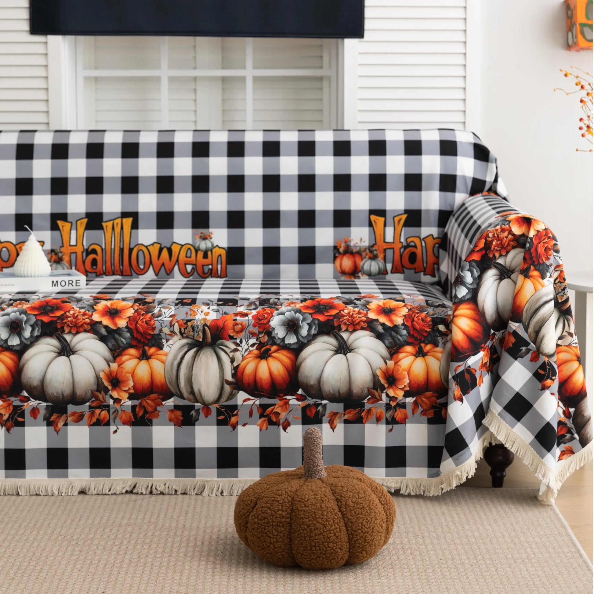 Halloween Pumpkin Plaid Sofa Cover – Give your living room a festive autumn makeover with this black-and-white buffalo check sofa cover, adorned with vibrant pumpkins, sunflowers, and “Happy Halloween” lettering. Crafted from soft, durable fabric with decorative fringe, it protects your couch from dust, spills, and wear while adding a cozy seasonal charm. Perfect for fall décor, Halloween parties, and farmhouse-style interiors, this easy-to-clean slipcover brings warmth and holiday spirit to any space.
