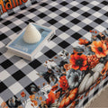 Halloween Pumpkin Plaid Sofa Cover – Give your living room a festive autumn makeover with this black-and-white buffalo check sofa cover, adorned with vibrant pumpkins, sunflowers, and “Happy Halloween” lettering. Crafted from soft, durable fabric with decorative fringe, it protects your couch from dust, spills, and wear while adding a cozy seasonal charm. Perfect for fall décor, Halloween parties, and farmhouse-style interiors, this easy-to-clean slipcover brings warmth and holiday spirit to any space.
