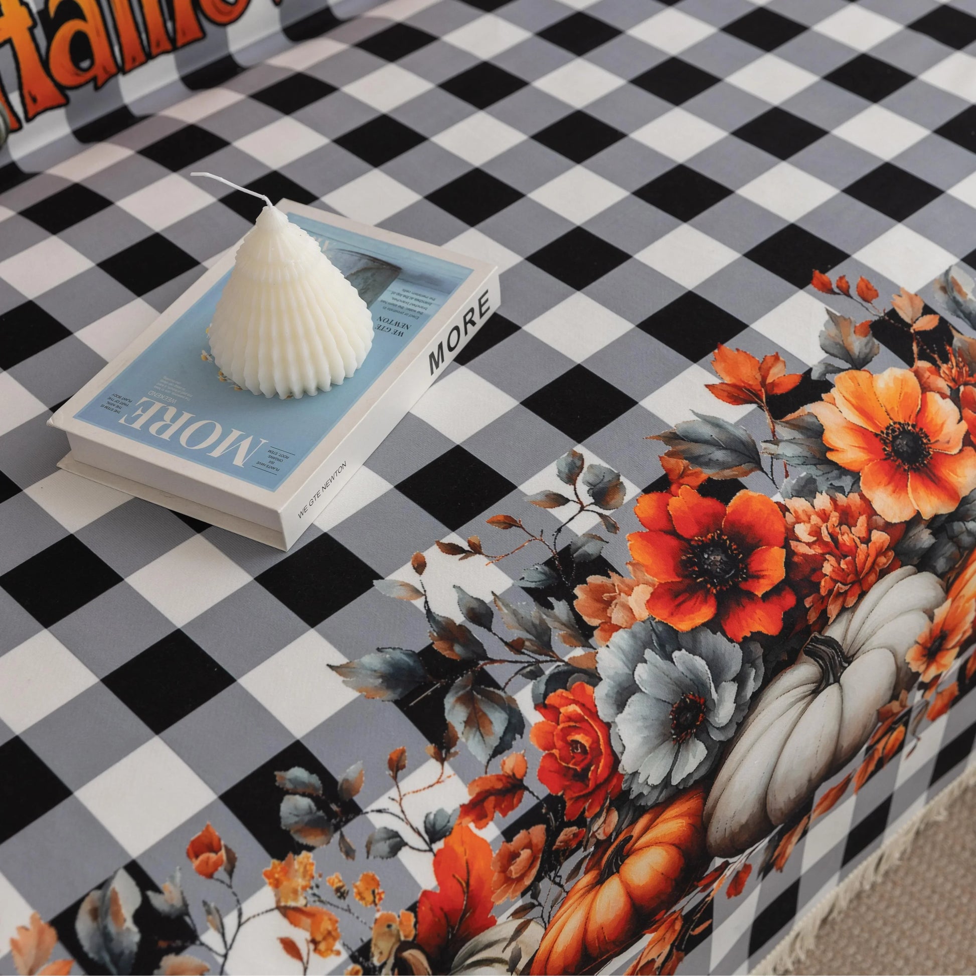 Halloween Pumpkin Plaid Sofa Cover – Give your living room a festive autumn makeover with this black-and-white buffalo check sofa cover, adorned with vibrant pumpkins, sunflowers, and “Happy Halloween” lettering. Crafted from soft, durable fabric with decorative fringe, it protects your couch from dust, spills, and wear while adding a cozy seasonal charm. Perfect for fall décor, Halloween parties, and farmhouse-style interiors, this easy-to-clean slipcover brings warmth and holiday spirit to any space.
