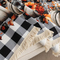 Halloween Pumpkin Plaid Sofa Cover – Give your living room a festive autumn makeover with this black-and-white buffalo check sofa cover, adorned with vibrant pumpkins, sunflowers, and “Happy Halloween” lettering. Crafted from soft, durable fabric with decorative fringe, it protects your couch from dust, spills, and wear while adding a cozy seasonal charm. Perfect for fall décor, Halloween parties, and farmhouse-style interiors, this easy-to-clean slipcover brings warmth and holiday spirit to any space.

