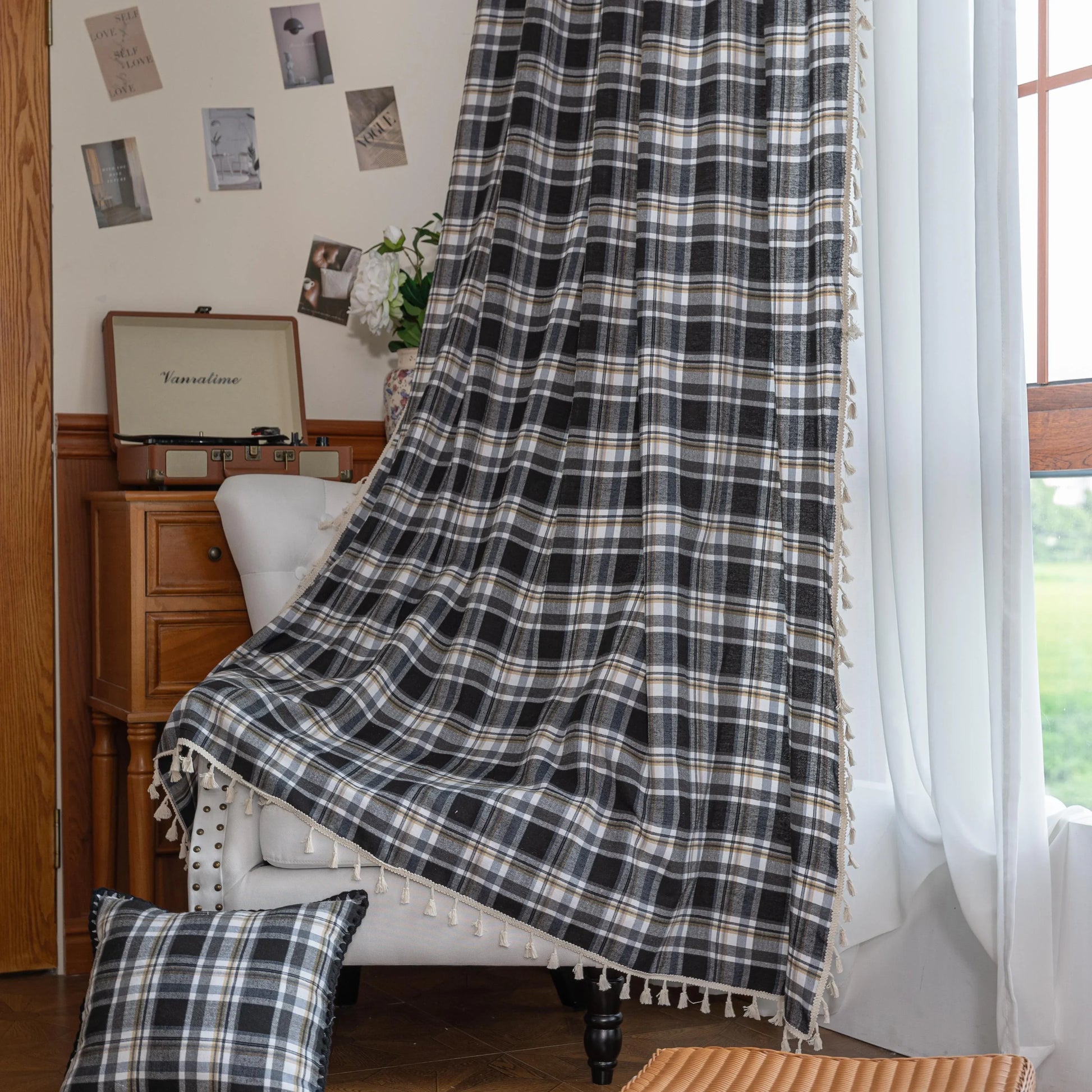 Black, gray, and beige plaid curtain fabric with a soft, woven texture and classic checkered pattern.