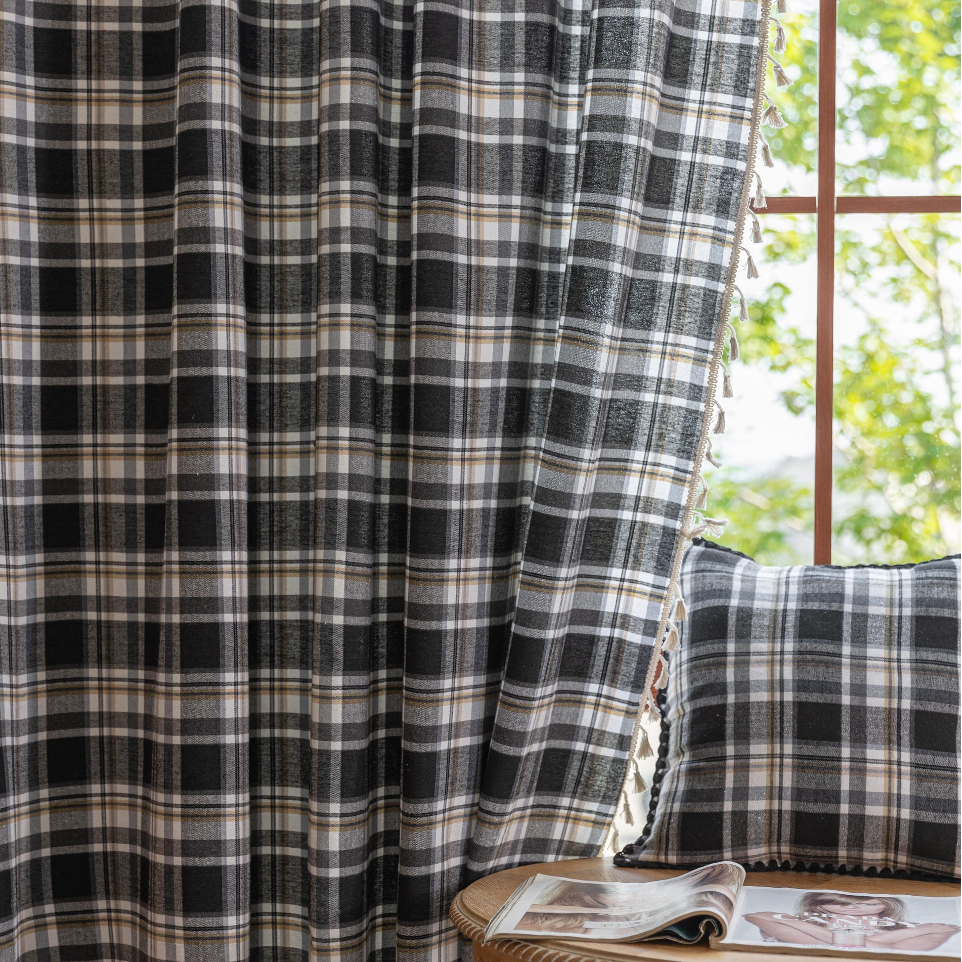 Black, gray, and beige plaid curtain fabric with a soft, woven texture and classic checkered pattern.