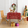 Christmas Santa Rectangular Tablecloth – Create a festive holiday atmosphere with this rectangular tablecloth featuring a snowy Christmas scene of Santa Claus, decorated pine trees, a cozy cottage, reindeer, and a cheerful snowman. Set against a rich red background with falling snowflakes and accented by playful multicolor tassels, it’s perfect for Christmas dinners, holiday parties, and seasonal home décor. Durable and eye-catching, this tablecloth brings warmth and joy to any dining space.
