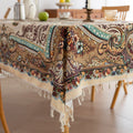 Beautiful bohemian tablecloth with intricate floral patterns and tassel edges, perfect for dining, parties, and festive home décor.