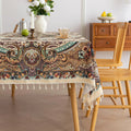 Beautiful bohemian tablecloth with intricate floral patterns and tassel edges, perfect for dining, parties, and festive home décor.