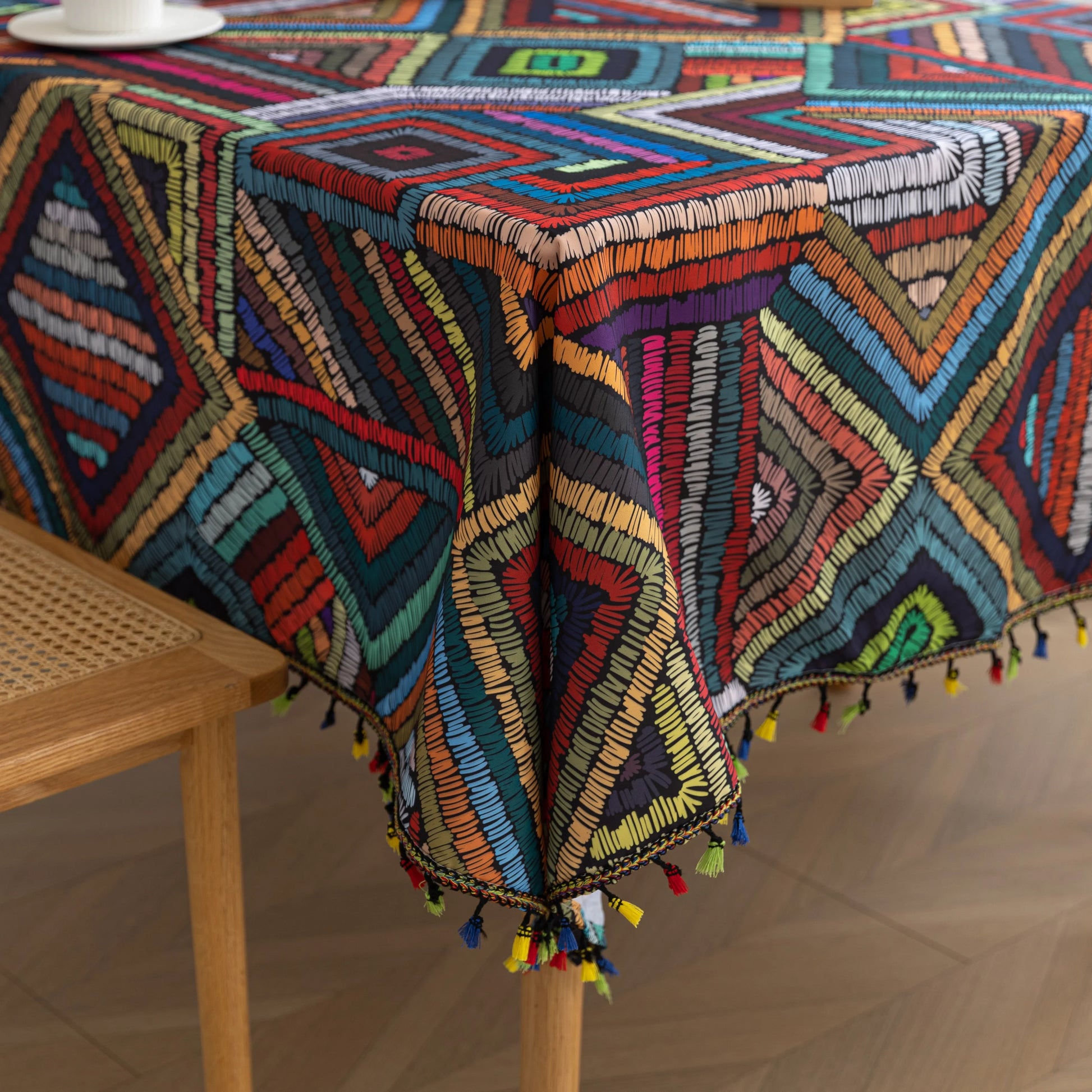 Add charm to your dining table with this colored irregular lattice tablecloth, blending vibrant style with durable fabric for everyday elegance.