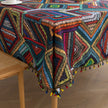 Add charm to your dining table with this colored irregular lattice tablecloth, blending vibrant style with durable fabric for everyday elegance.