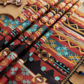 Vibrant bohemian tablecloth with colorful geometric patterns and playful tassel trim — perfect for adding warmth and personality to dining tables, picnics, and festive gatherings.