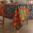 Colorful mandala tablecloth with intricate bohemian patterns and playful tassel edging ¡ª ideal for brightening up dining tables, outdoor picnics, or festive celebrations with vibrant charm.