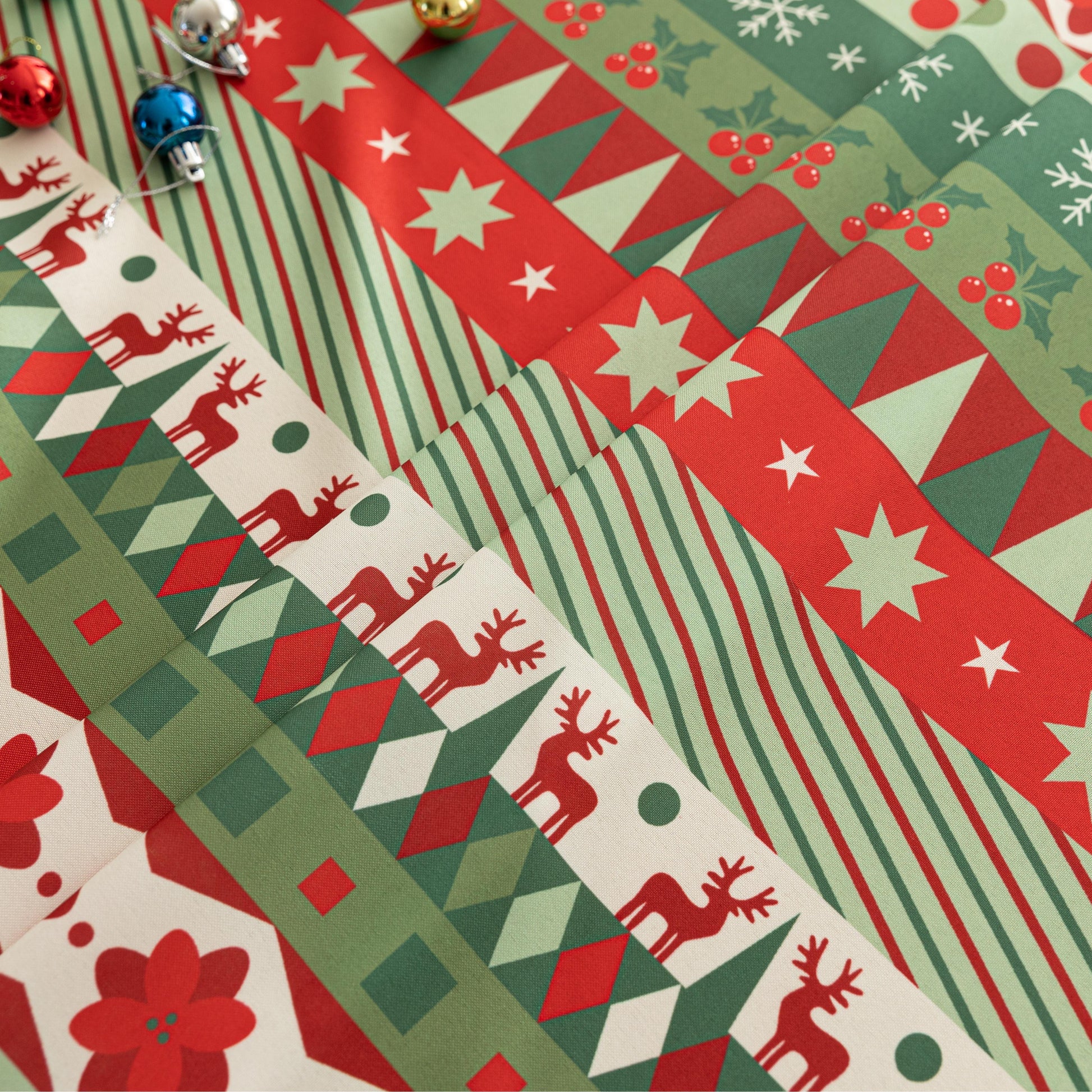 Festive Christmas tablecloth with red, green, and white patterns, perfect for holiday dining décor and creating a warm, cheerful atmosphere