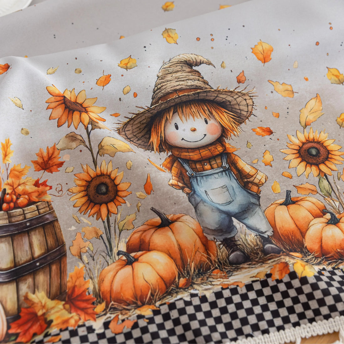 Autumn Harvest Rectangular Tablecloth – Add seasonal charm to your dining space with this festive rectangular tablecloth featuring a delightful harvest design of pumpkins, sunflowers, wooden barrels, and a friendly scarecrow. Accented with a black-and-white checkered border and finished with cream tassels, it brings a cozy farmhouse feel to your table. Perfect for fall gatherings, Thanksgiving dinners, and rustic home décor, this durable and vibrant tablecloth enhances any seasonal celebration.
