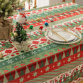 Festive Christmas tablecloth with red, green, and white patterns, perfect for holiday dining décor and creating a warm, cheerful atmosphere
