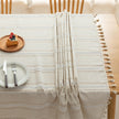 Beige Linen Tassel Tablecloth ¨C Elevate your dining area with this elegant beige tablecloth, crafted from a soft linen-blend fabric for a natural, breathable feel. Featuring subtle white woven stripes and charming tassel edges, it adds a touch of rustic sophistication to both casual meals and festive gatherings. Durable, easy to maintain, and versatile in style, this tablecloth blends seamlessly with farmhouse, bohemian, or modern home d¨¦cor while protecting your table in timeless fashion.
