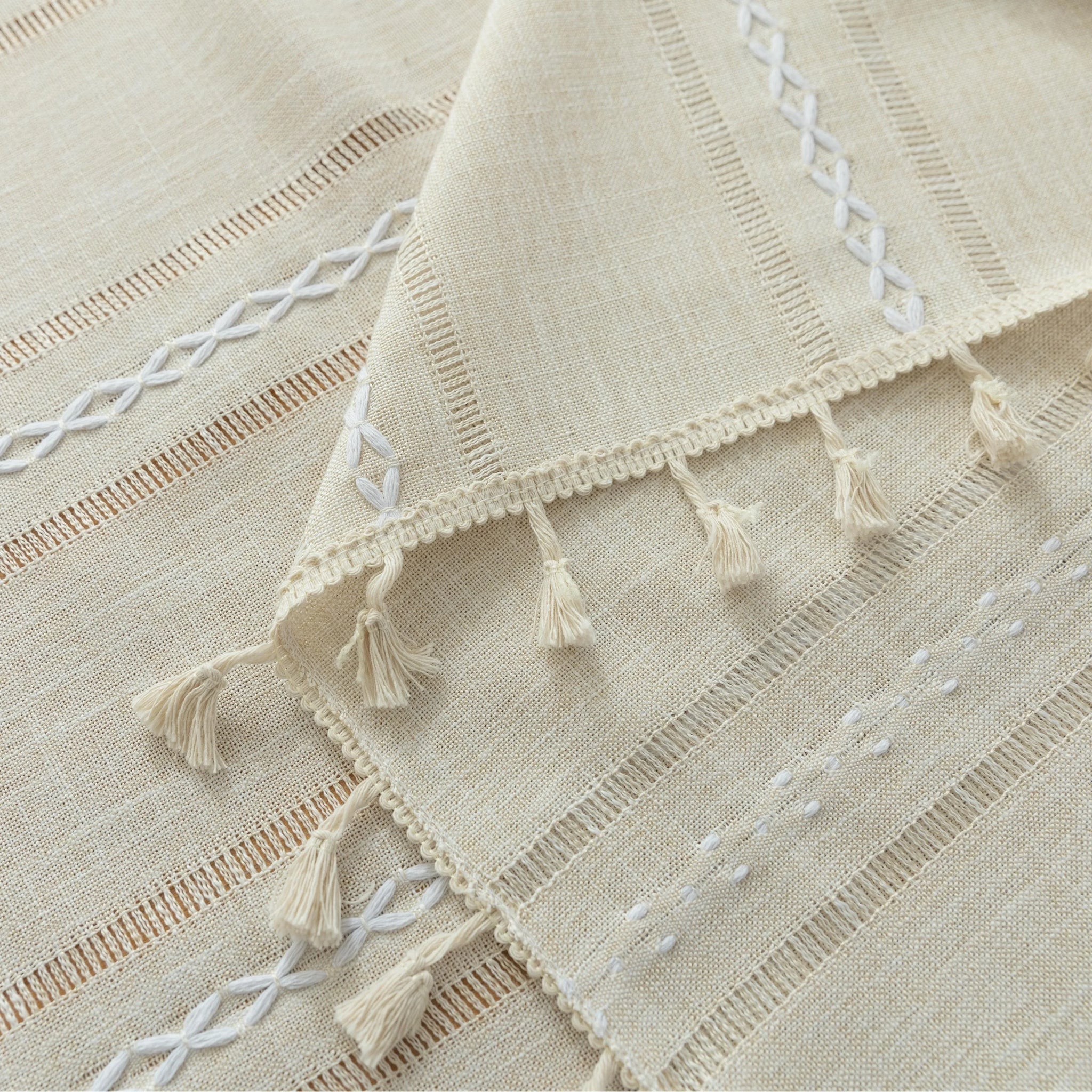 Beige Linen Tassel Tablecloth – Elevate your dining area with this elegant beige tablecloth, crafted from a soft linen-blend fabric for a natural, breathable feel. Featuring subtle white woven stripes and charming tassel edges, it adds a touch of rustic sophistication to both casual meals and festive gatherings. Durable, easy to maintain, and versatile in style, this tablecloth blends seamlessly with farmhouse, bohemian, or modern home décor while protecting your table in timeless fashion.
