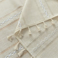 Beige Linen Tassel Tablecloth – Elevate your dining area with this elegant beige tablecloth, crafted from a soft linen-blend fabric for a natural, breathable feel. Featuring subtle white woven stripes and charming tassel edges, it adds a touch of rustic sophistication to both casual meals and festive gatherings. Durable, easy to maintain, and versatile in style, this tablecloth blends seamlessly with farmhouse, bohemian, or modern home décor while protecting your table in timeless fashion.
