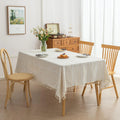 Beige Linen Tassel Tablecloth – Elevate your dining area with this elegant beige tablecloth, crafted from a soft linen-blend fabric for a natural, breathable feel. Featuring subtle white woven stripes and charming tassel edges, it adds a touch of rustic sophistication to both casual meals and festive gatherings. Durable, easy to maintain, and versatile in style, this tablecloth blends seamlessly with farmhouse, bohemian, or modern home décor while protecting your table in timeless fashion.
