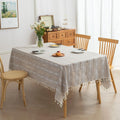 Rustic Linen Tassel Tablecloth – Add a touch of natural elegance to your dining space with this beautiful linen-blend tablecloth, featuring delicate white embroidered stripes and charming tassel edging. Its neutral beige tone effortlessly complements farmhouse, bohemian, and modern interiors, making it perfect for everyday meals or special gatherings. Durable, soft, and easy to clean, this tablecloth not only protects your table but also enhances your dining experience with timeless style and texture.
