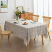 Rustic Linen Tassel Tablecloth ¨C Add a touch of natural elegance to your dining space with this beautiful linen-blend tablecloth, featuring delicate white embroidered stripes and charming tassel edging. Its neutral beige tone effortlessly complements farmhouse, bohemian, and modern interiors, making it perfect for everyday meals or special gatherings. Durable, soft, and easy to clean, this tablecloth not only protects your table but also enhances your dining experience with timeless style and texture.
