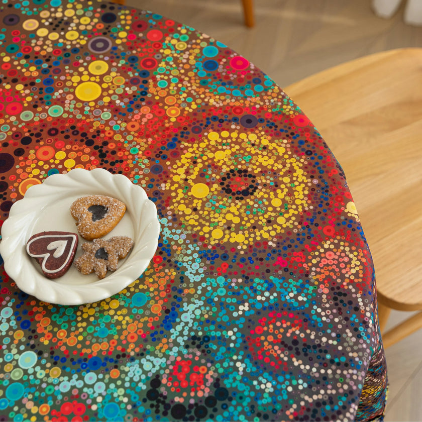 Colorful Bohemian Round Tablecloth ¨C Brighten your dining space with this vibrant round tablecloth featuring an eclectic mix of circular mandala-inspired patterns in bold red, yellow, turquoise, and blue hues. Accented with playful multicolor tassels, it adds a lively and artistic touch to any table setting. Perfect for kitchen tables, garden parties, picnics, or festive gatherings, this durable and eye-catching tablecloth is ideal for both everyday meals and special occasions.
