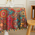 Colorful Bohemian Round Tablecloth – Brighten your dining space with this vibrant round tablecloth featuring an eclectic mix of circular mandala-inspired patterns in bold red, yellow, turquoise, and blue hues. Accented with playful multicolor tassels, it adds a lively and artistic touch to any table setting. Perfect for kitchen tables, garden parties, picnics, or festive gatherings, this durable and eye-catching tablecloth is ideal for both everyday meals and special occasions.
